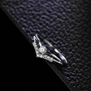 RING NEW DAINTY 925SS STAMPED W/MOISSANITE SIM